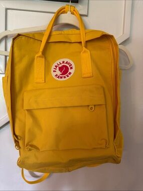 Fjallraven Kanken Backpack in Yellow with Red Logo